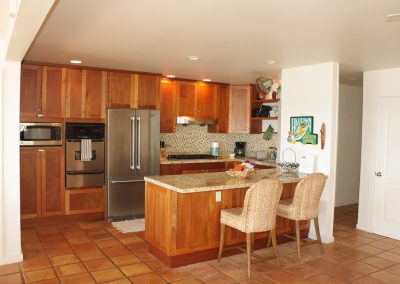 Kitchen & island of 1st floor in Kaleakai vacation house